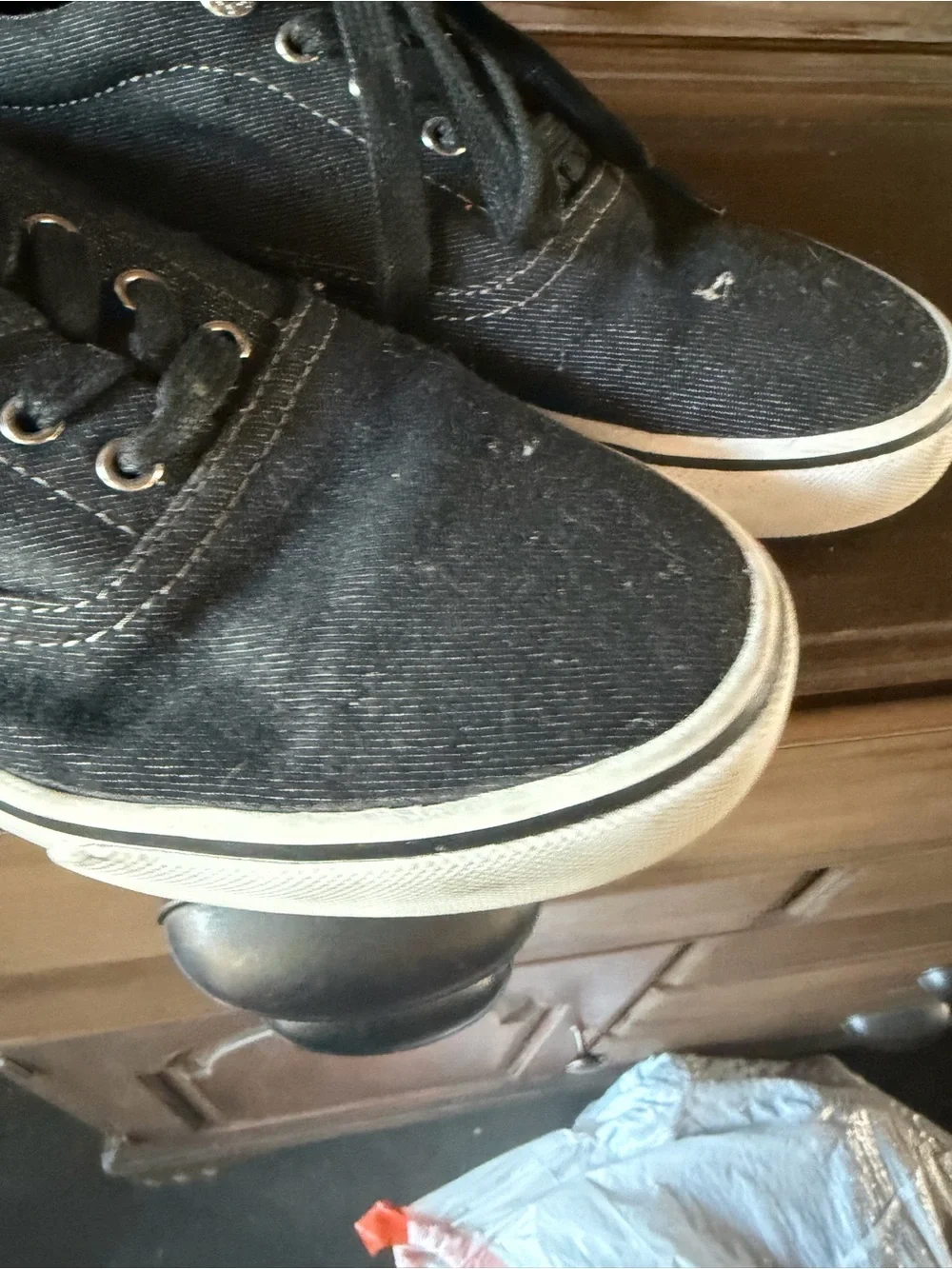 Levi's Black Canvas Low-Top Sneakers with Brown Heel Accent and White Sole